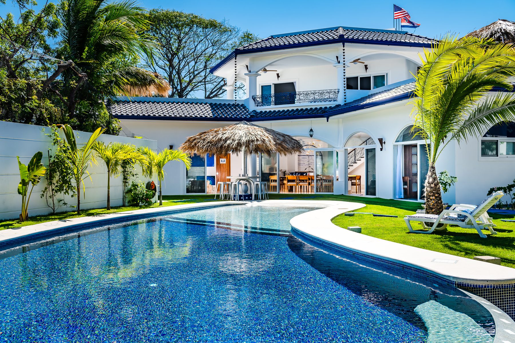Pool and palapa lounge in the courtyard at Villa Azueca