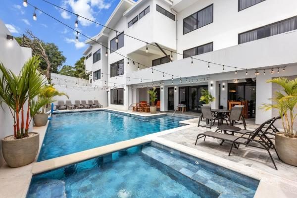 Pool deck with chaise lounges at Villa Norma